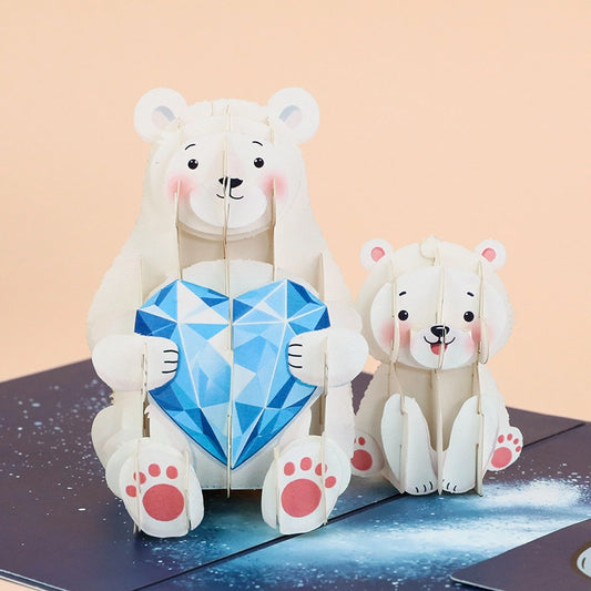 3D pop-up Father's Day card with polar bear dad and child holding blue heart