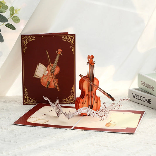 3D violin pop-up card featuring a detailed violin, bow, and musical notes