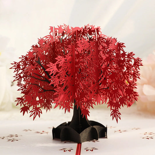 3D red tree of life pop up greeting card displayed open