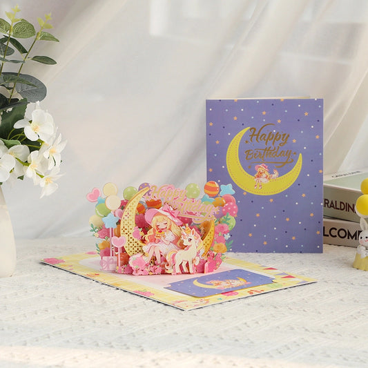 3D pop-up birthday card with colorful unicorn, birthday girl, balloons, flowers and crescent moon