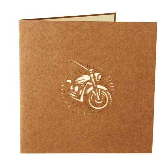 Brown kraft envelope with laser-cut motorcycle silhouette design for the 3D pop-up card.
