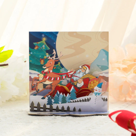 Santa and reindeer 3D Christmas greeting card displayed open
