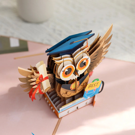 Close up of 3D graduation owl pop up greeting card