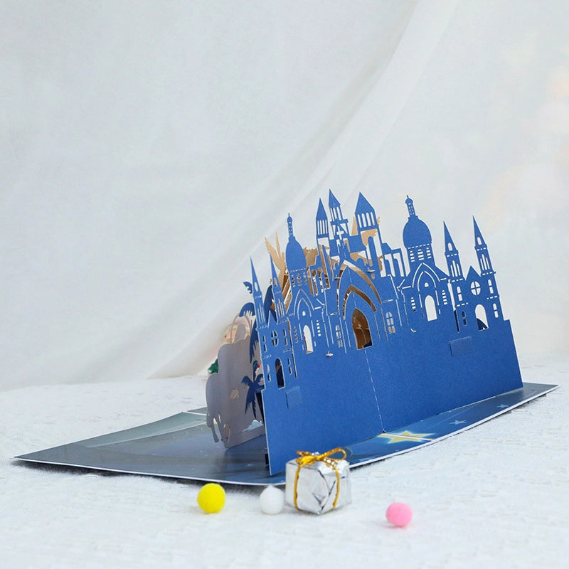 Side view of layered 3D Nativity Christmas pop-up card showing detailed paper construction