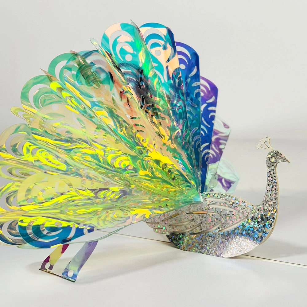 Detailed 3D peacock pop-up card with colorful fan feathers