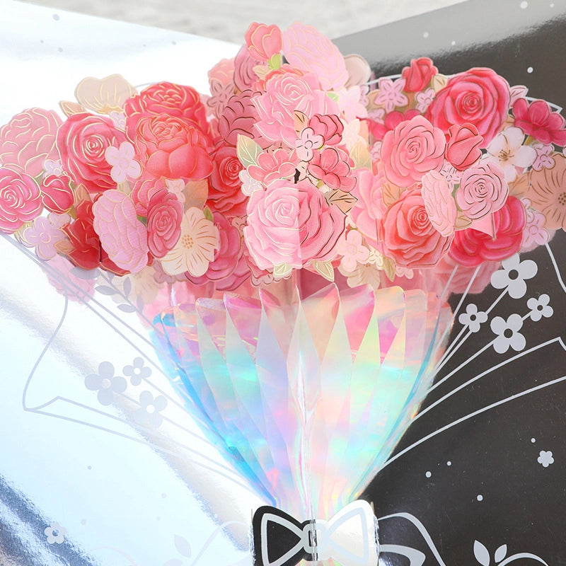 Close-up of detailed pink and red roses on 3D pop-up card