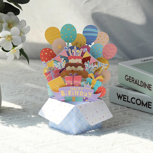 3D pop-up birthday card with colorful balloons, birthday cake and gifts