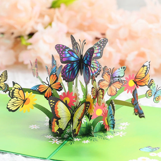 3D pop-up butterfly card featuring colorful butterflies and blooming flowers in a garden scene