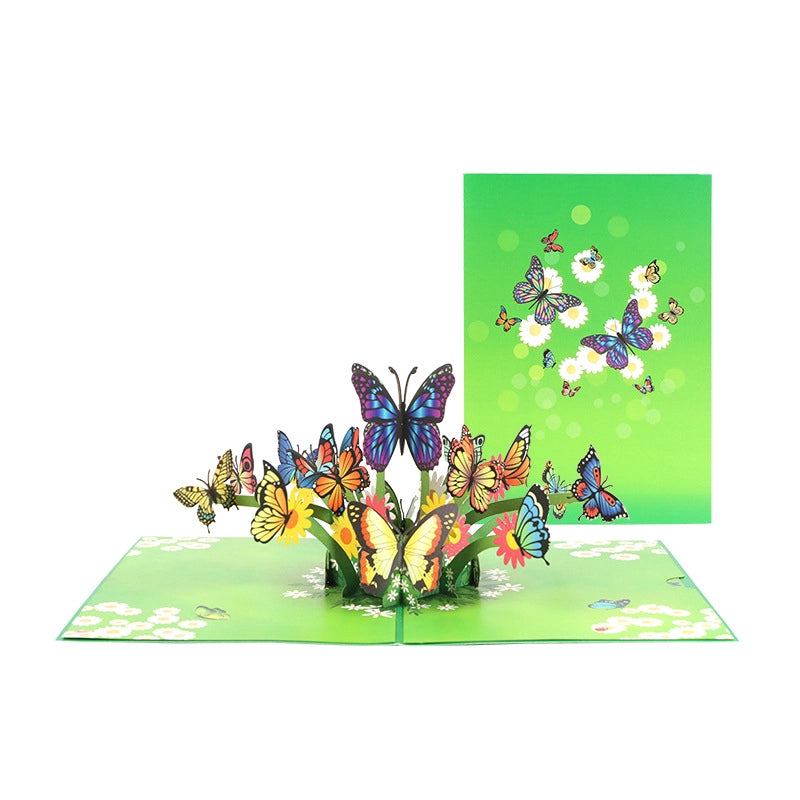 Colorful butterfly pop-up card with floral garden design and green envelope