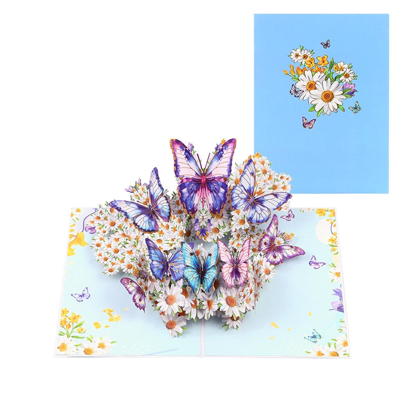 Closed view of pink 3D pop-up card featuring a heart-shaped bouquet of flowers and butterflies on the cover