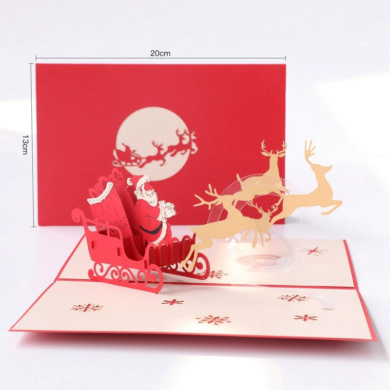 Santa sleigh 3D greeting card dimensions showing 20cm width and 13cm height, detailed paper cut art of Christmas reindeer and snowflakes.