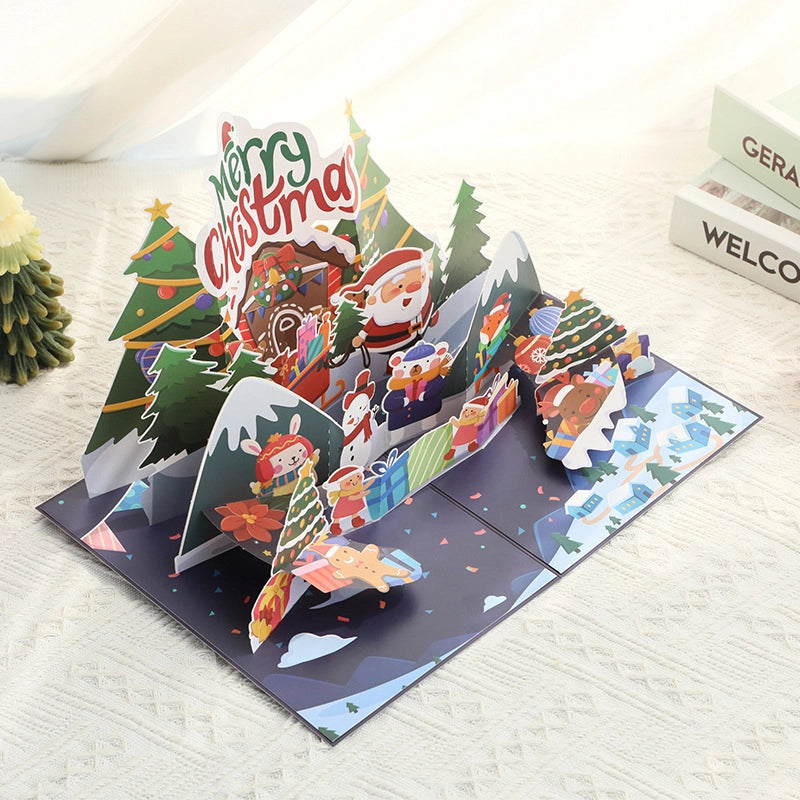 Detailed 3D pop-up Christmas greeting card featuring Santa and colorful holiday characters