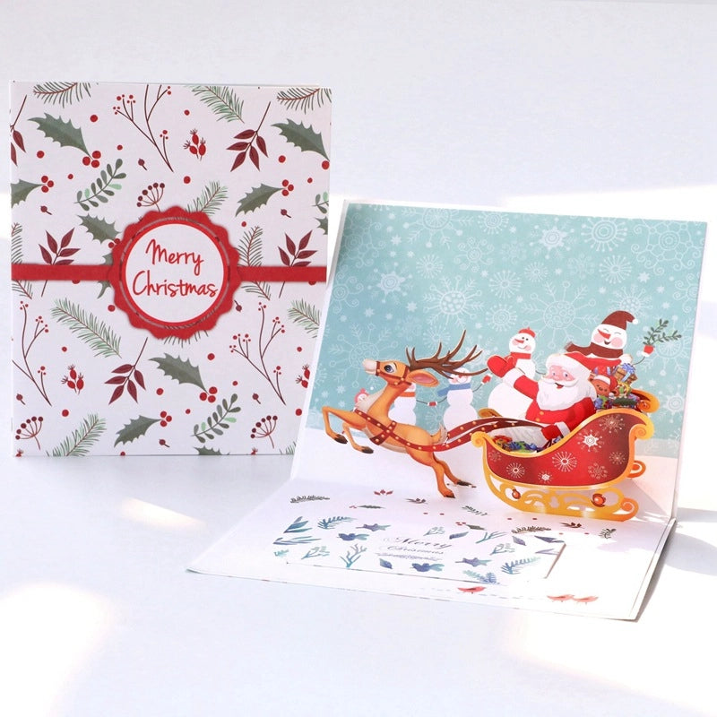 Santa and reindeer 3D pop-up Christmas greeting card with festive envelope