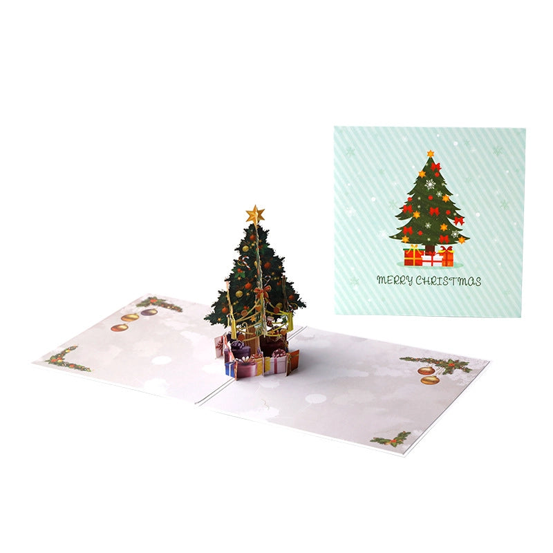 Christmas 3D pop-up card with decorated tree and presents viewed from the front