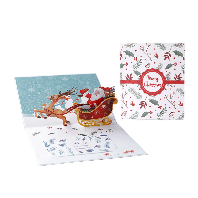3D Santa and reindeer Christmas card displayed open with holiday envelope