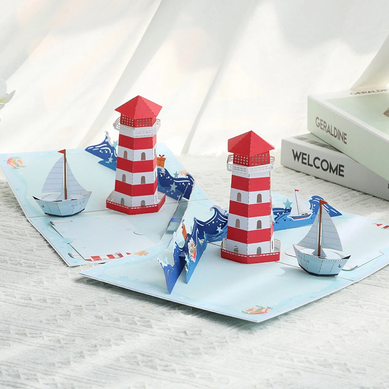 Open 3D lighthouse greeting card with red and white lighthouse