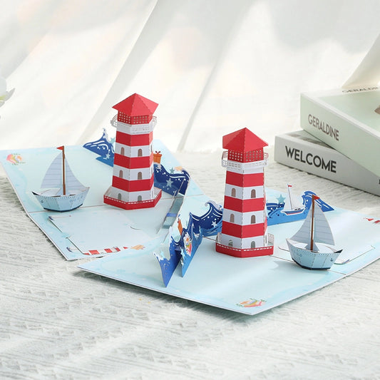Open 3D lighthouse greeting card with red and white lighthouse
