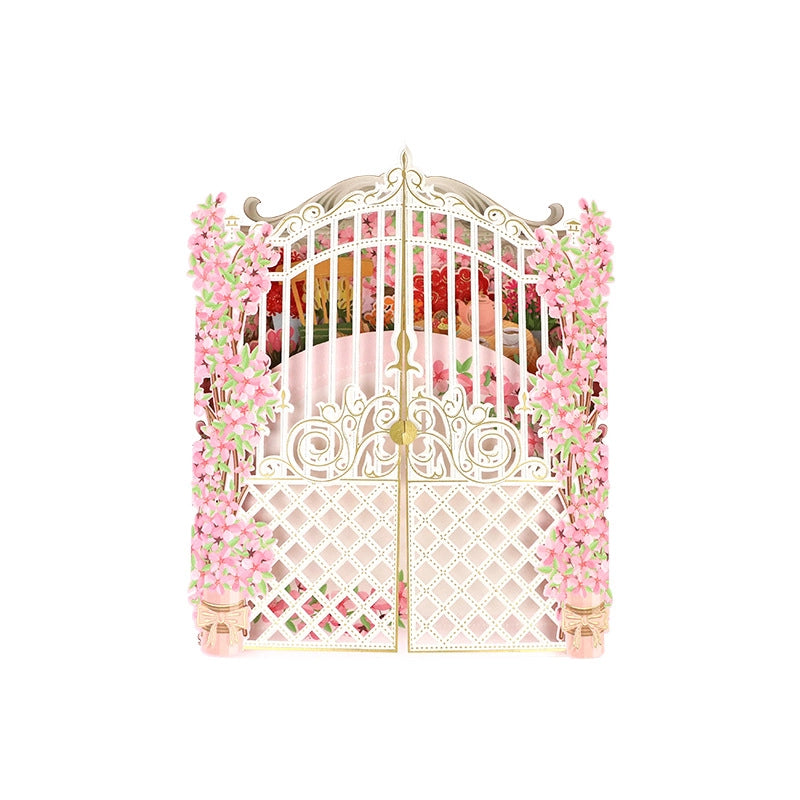 Front cover of the greeting card featuring white ornate double doors decorated with climbing pink flowers