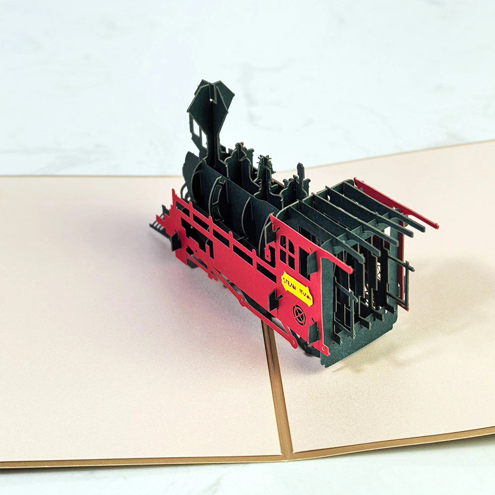Detailed 3D pop-up steam train card viewed from the front