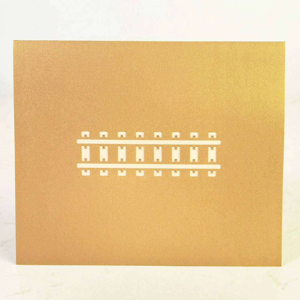 Steam train pop-up card showing intricate layered paper details