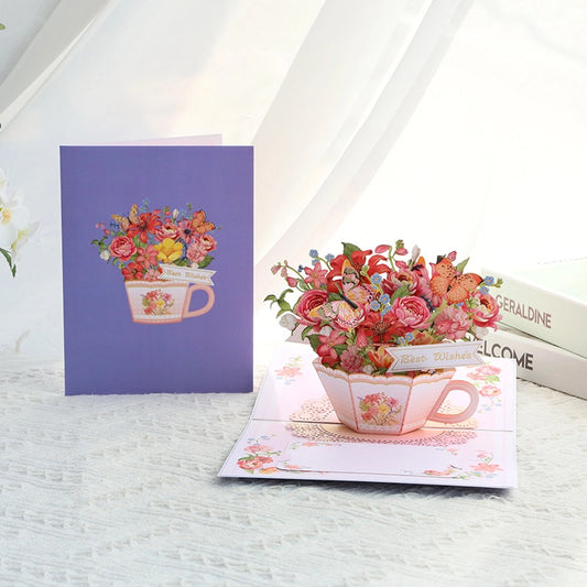 Purple cover greeting card opening to reveal pink teacup flower bouquet pop-up