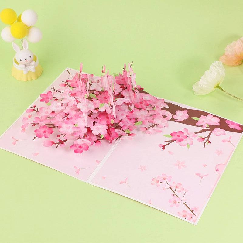 Close-up of pink cherry blossom 3D pop-up greeting card