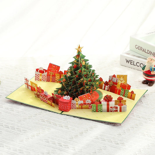 3D Christmas pop up greeting card with decorated tree and presents