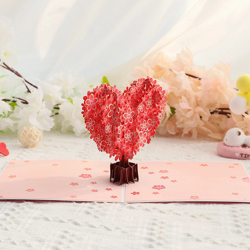 Red floral heart tree 3D pop-up card displayed open