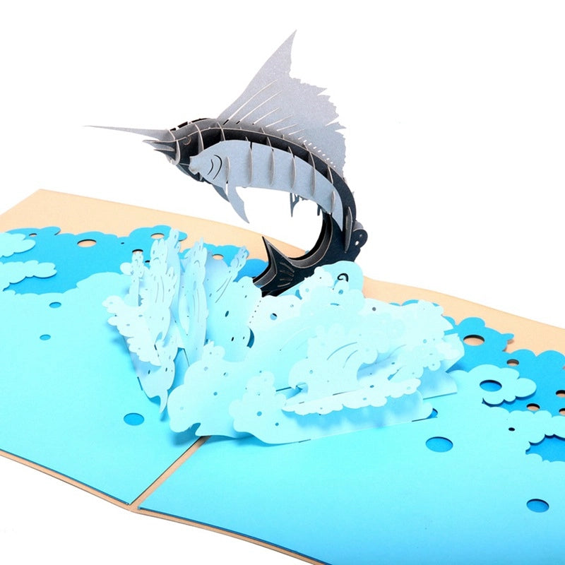 3D marlin pop-up card showing layered ocean wave details