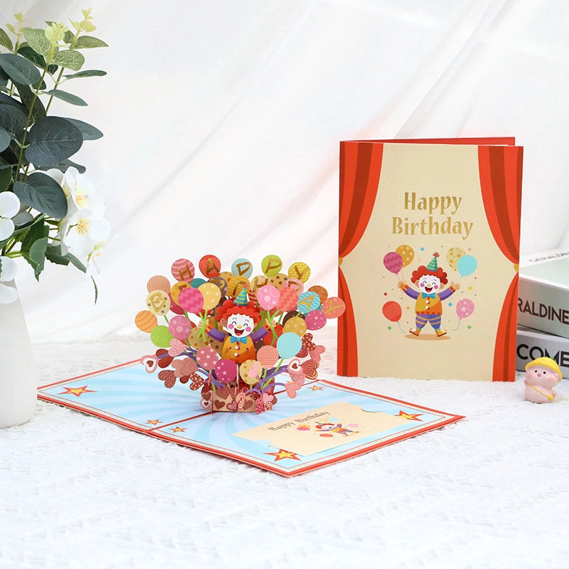 3D pop-up birthday card with colorful balloons and clown