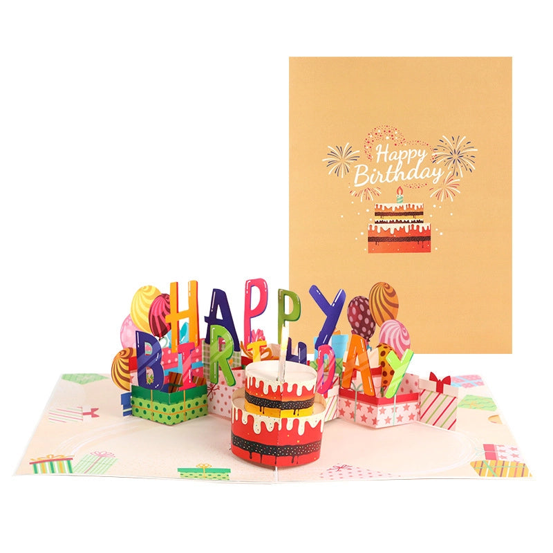 Happy birthday pop up card opened showing 3D cake and gift decorations
