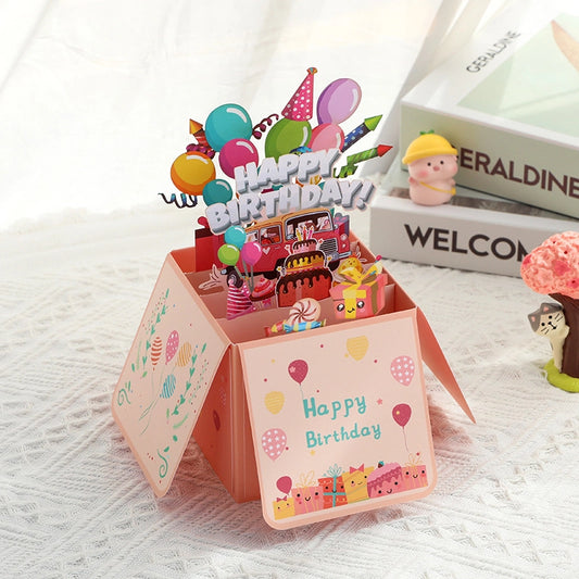 Colorful 3D birthday pop-up card with balloons and party decorations