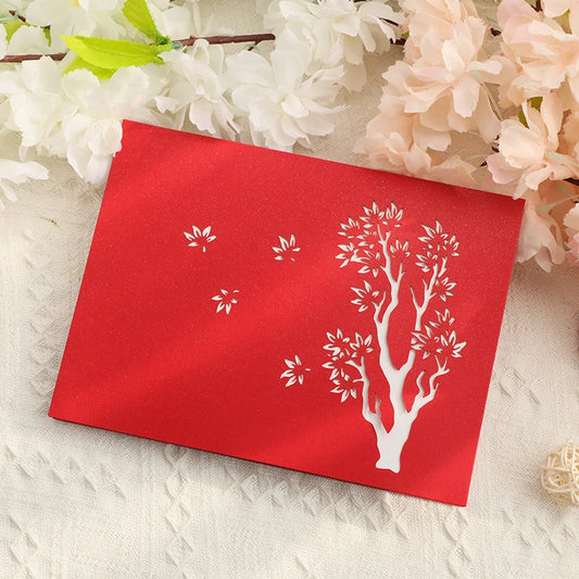 Red tree of life pop up card front cover with tree design
