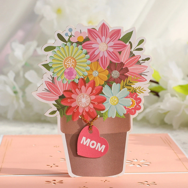 Mother's Day 3D popup card with vibrant paper flowers displayed on a table setting as a heartfelt surprise
