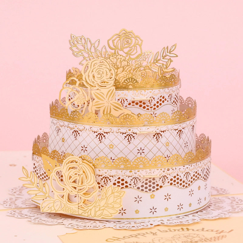 Elegant 3D birthday cake pop-up card with floral and gold details