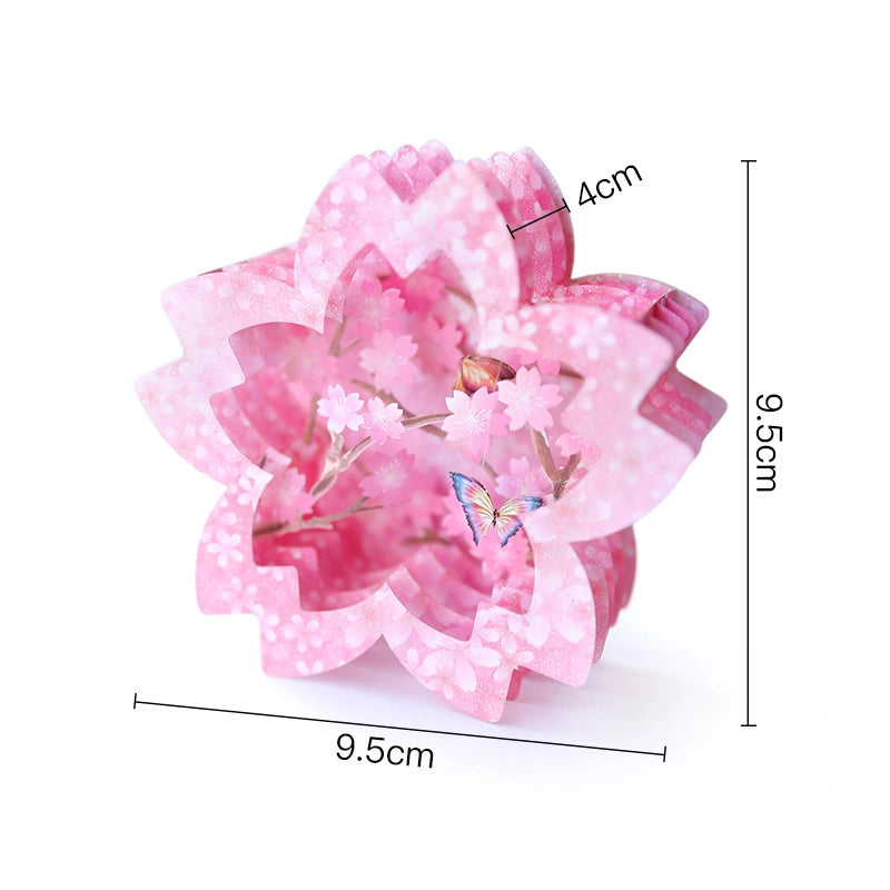Dimension diagram of the pink cherry blossom pop-up card showing measurements: 9.5cm width, 9.5cm height, and 4cm depth
