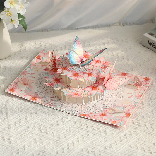 Close up of colorful butterfly and pink flower details on 3D greeting card