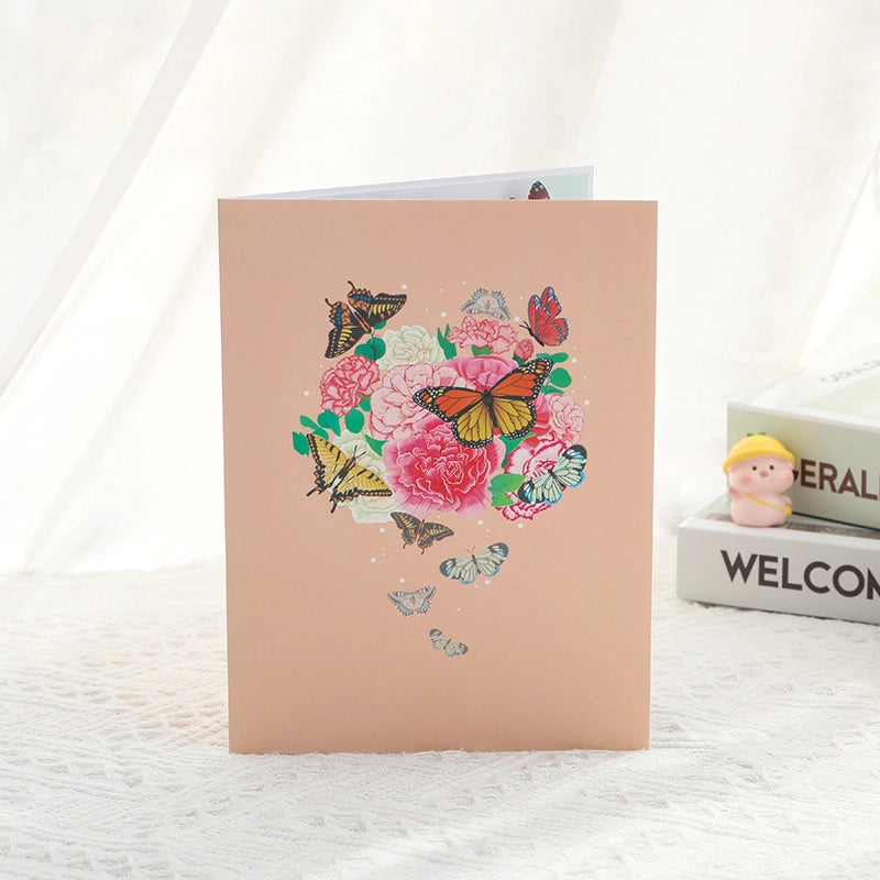Side angle of the butterfly garden pop-up card showing the depth and layering of the paper flowers.