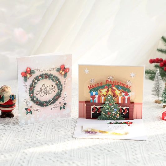 3D pop-up Christmas card with festive fireplace and Christmas tree