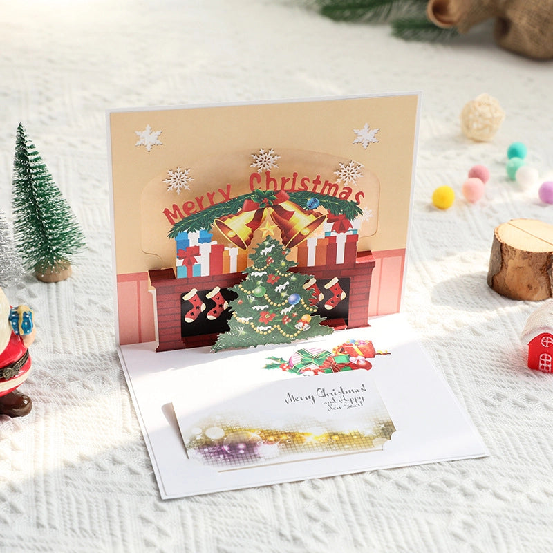 Open 3D Christmas pop-up card with Christmas tree gifts and stockings