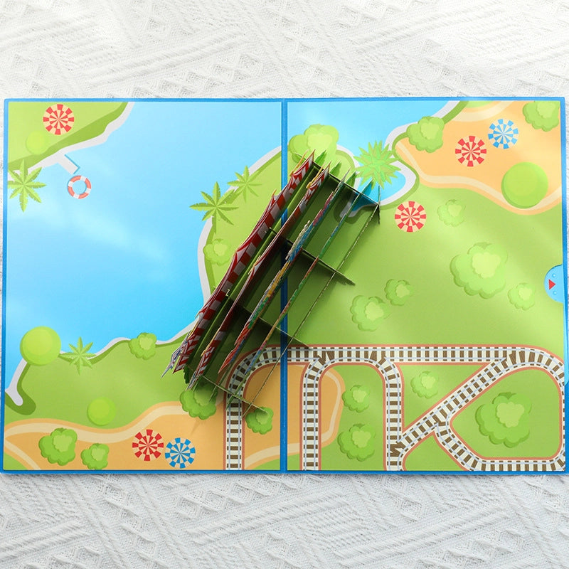 Inside view of pop-up card mechanism showing folded paper layers and amusement park map background design
