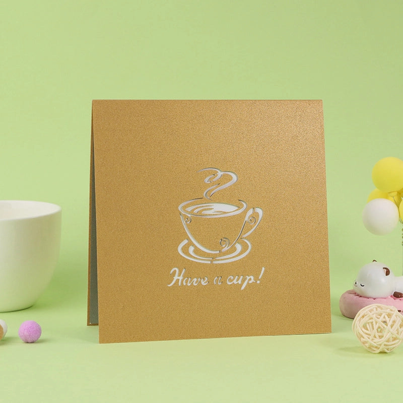Close up view of the intricate paper cutting details inside the coffee themed 3D card.
