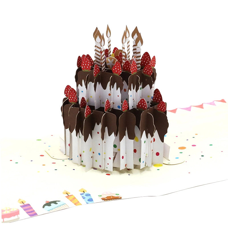 Detailed top-down view of the intricate laser-cut layers of the 3D strawberry chocolate cake pop-up card.
