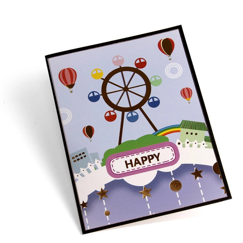 Amusement park themed greeting card with purple Ferris wheel pop-up and bicycle illustration inside.
