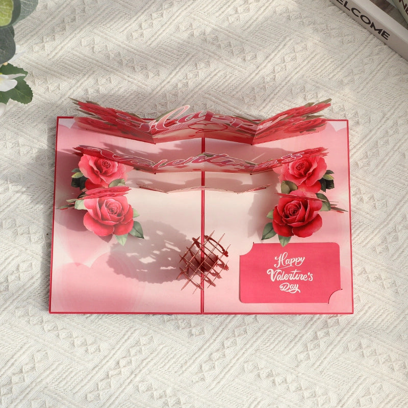 Top view of open Valentine's card showing flat pop-up mechanism and writing space
