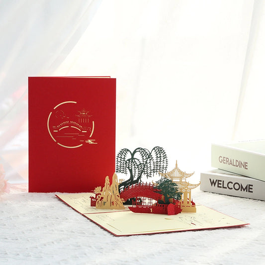 Traditional Chinese scenery pop-up card showing 3D bridge and pavilion design