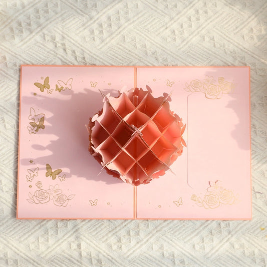 Pink crown pop-up greeting card viewed from above