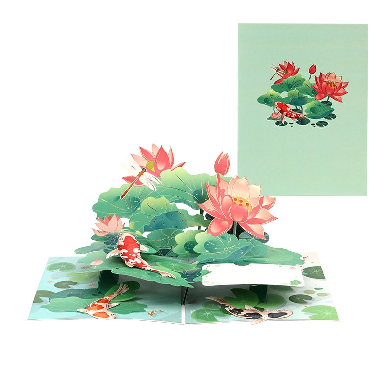 Lotus and koi fish 3D pop-up greeting card displayed as paper art