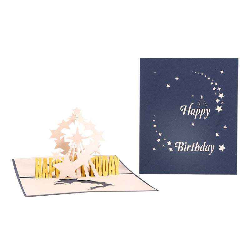 White background product shot showing both the closed navy blue cover and the open 3D starry birthday card mechanism.
