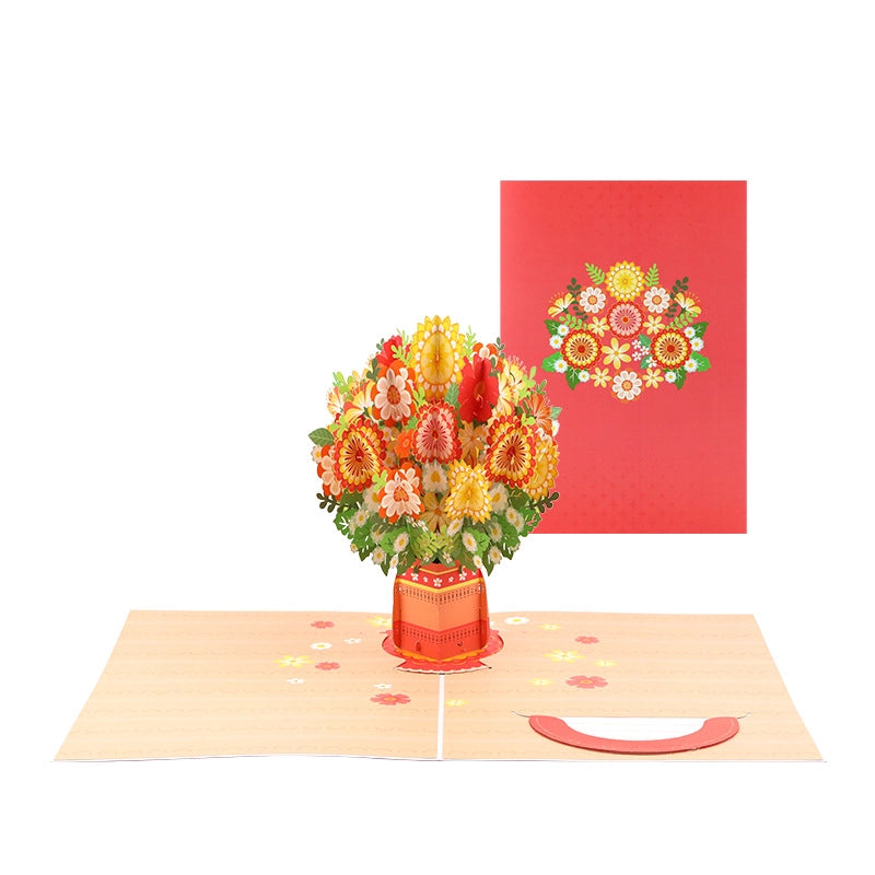 Red envelope with floral design next to the open 3D flower vase pop-up card